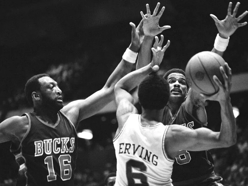 Julius Erving, Marques Johnson and Sidney Moncrief