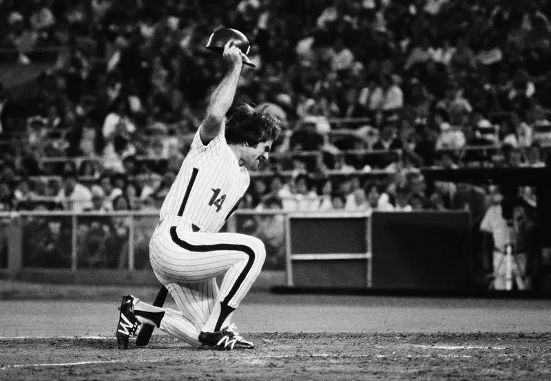 Pete Rose throwing hat on ground