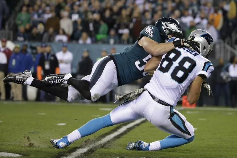 Casey Matthews tackles Carolina Panthers' Greg Olsen