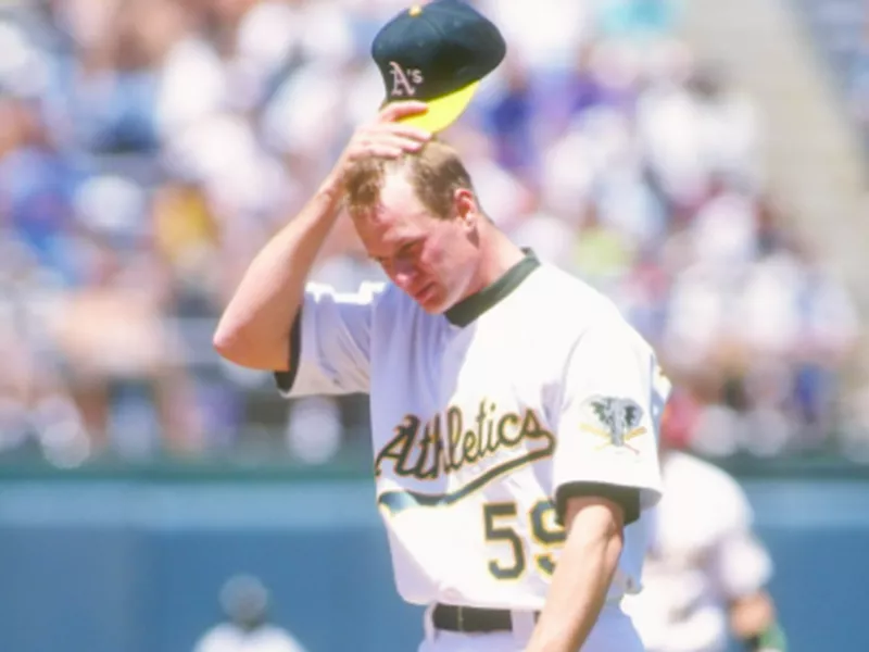 Todd Van Poppel wiping sweat off his head
