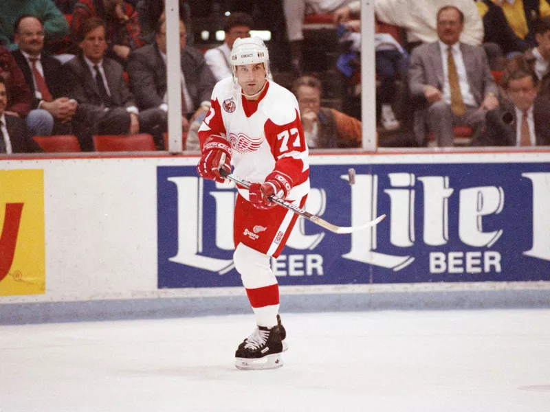 Paul Coffey passes the puck off