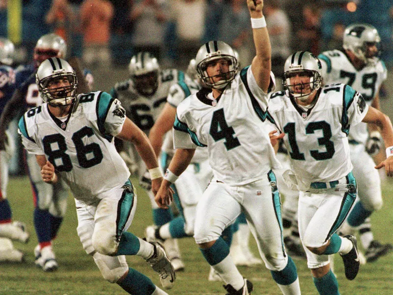 John Kasay and teammates celebrate game winning field goal