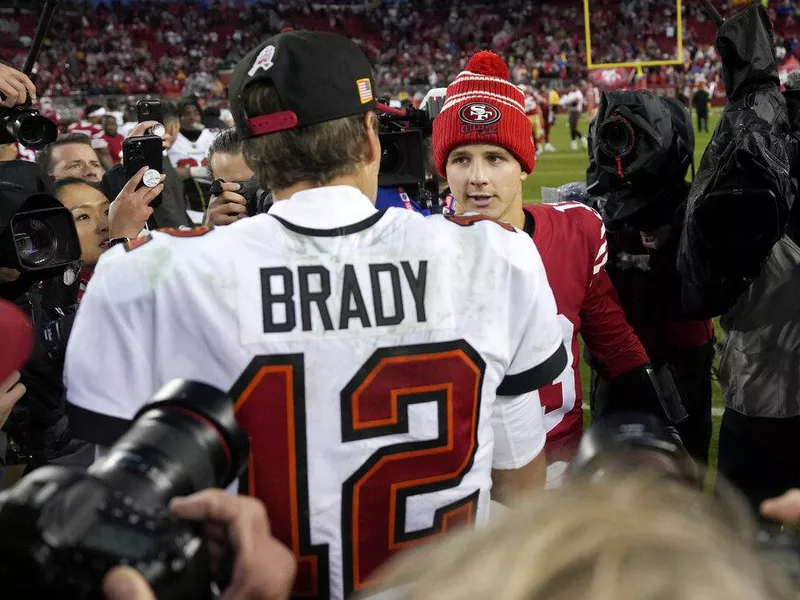 Tom Brady and Brock Purdy