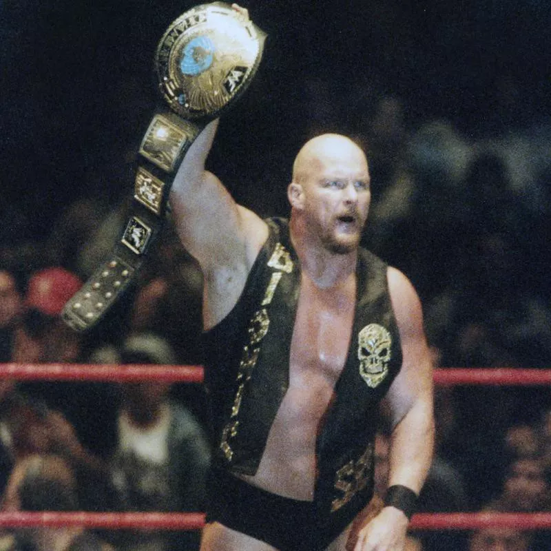 Steve Austin holding belt