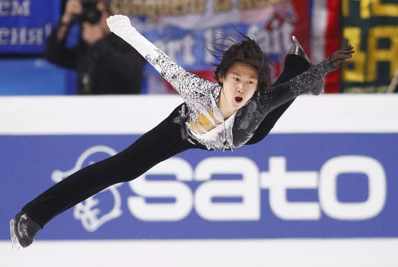 Denis Ten jumping on ice