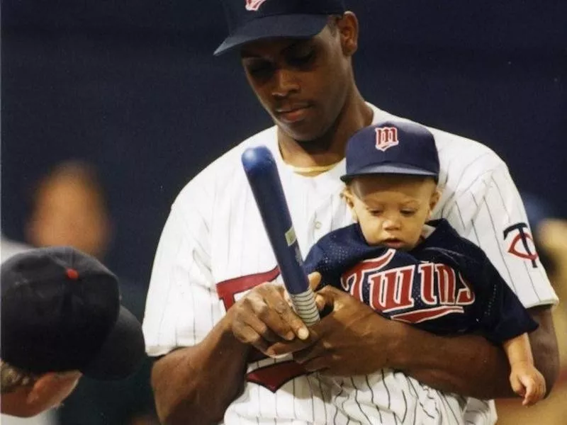 Patrick Mahomes as a baby with father Pat Mahomes