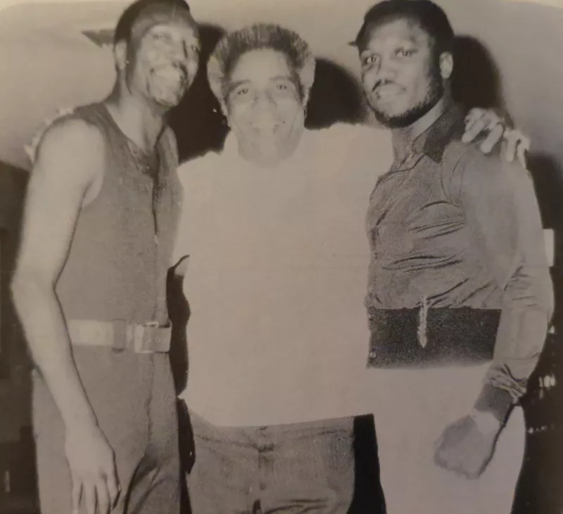 Bob Foster and Joe Frazier posing