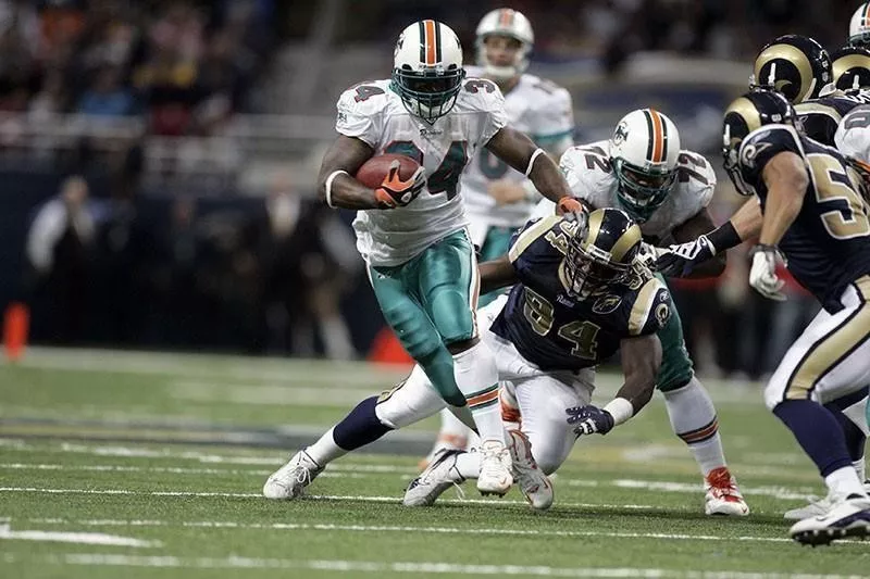 Ricky Williams running for the Miami Dolphins in 2008