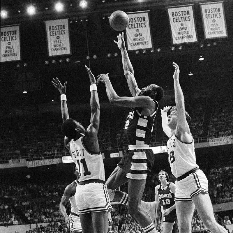 Nate Thurmond gets altitude to score against Boston's Charlie Scott