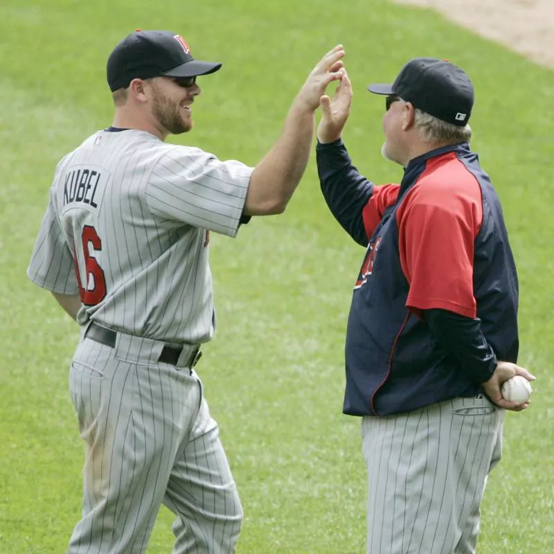 Ron Gardenhire congratulates Minnesota Twins' Jason Kubel