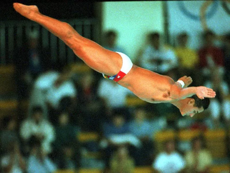 Greg Louganis performs