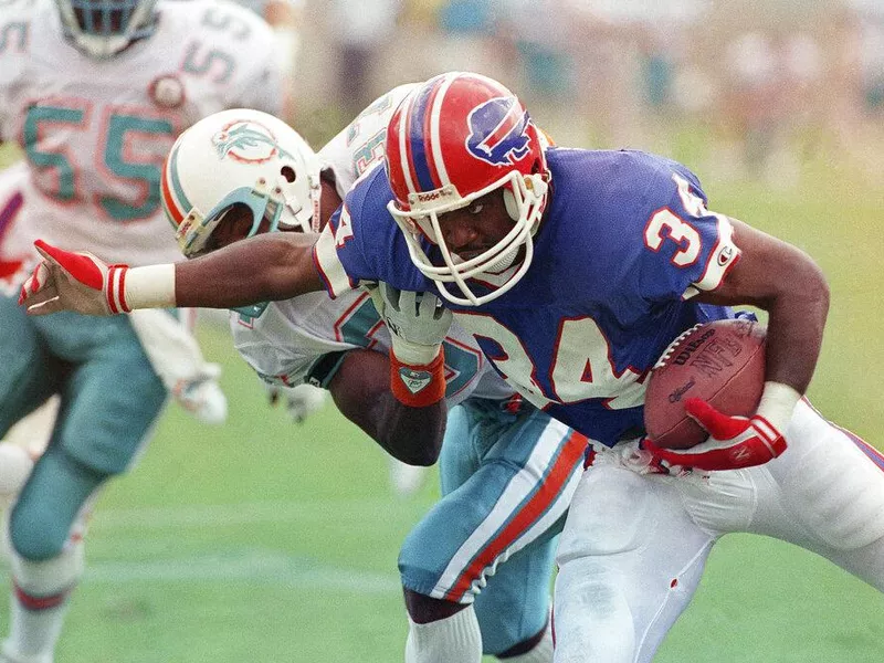 Thurman Thomas, J.B. Brown