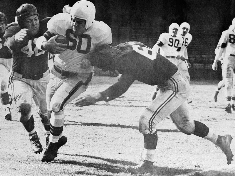 Otto Graham running with ball down the field