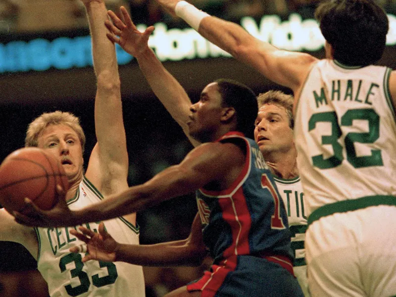 Isiah Thomas gets stopped by Larry Bird