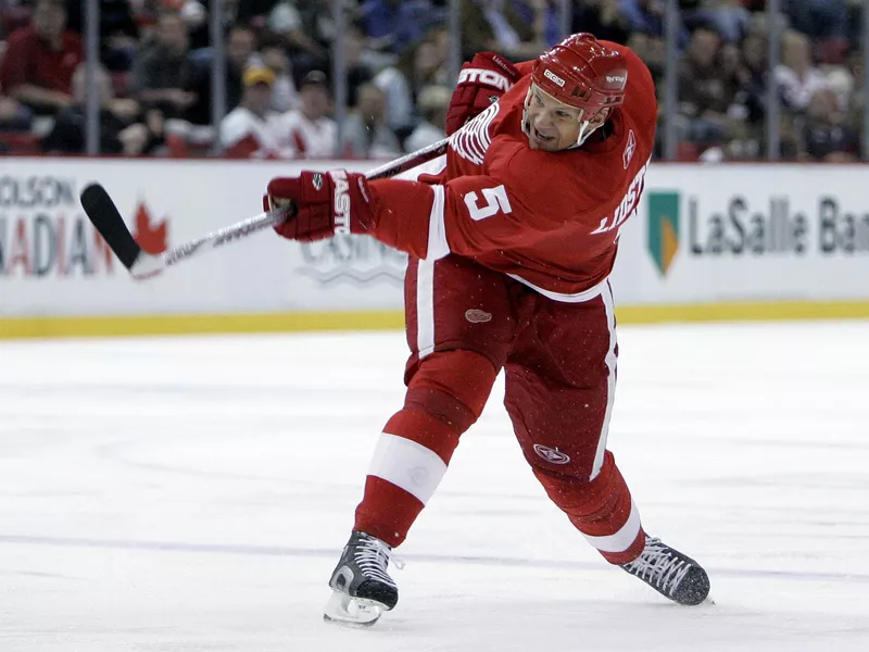 Detroit Red Wings' Niklas Lidstrom shoots against Tampa Bay Lightning