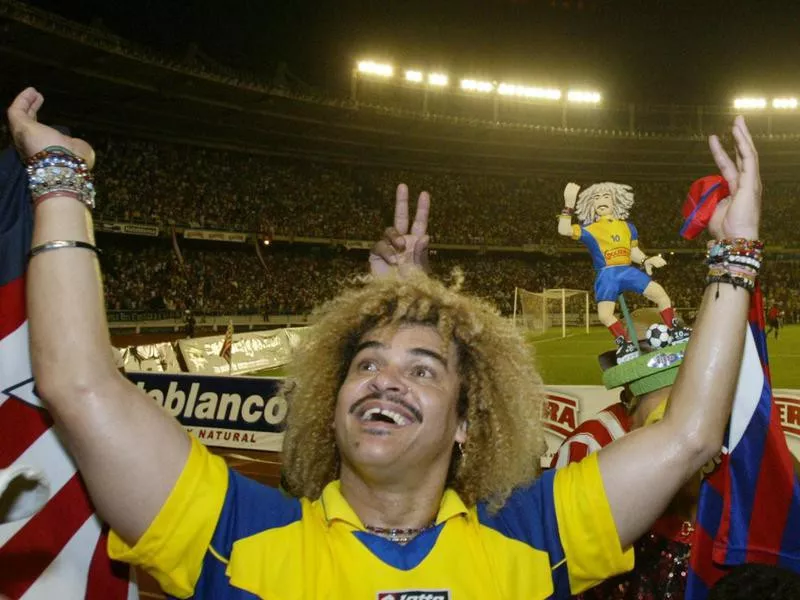 Carlos Valderrama waves