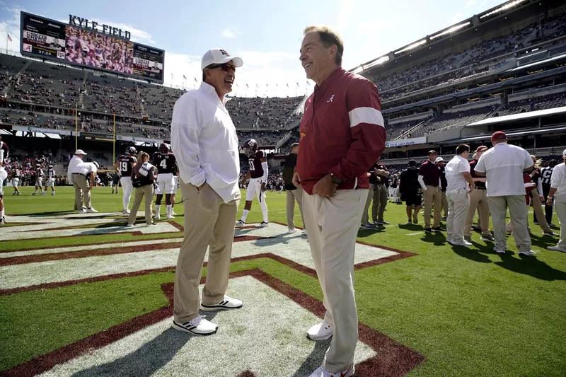 Texas A&M head coach Jimbo Fisher and Alabama head coach Nick Saban