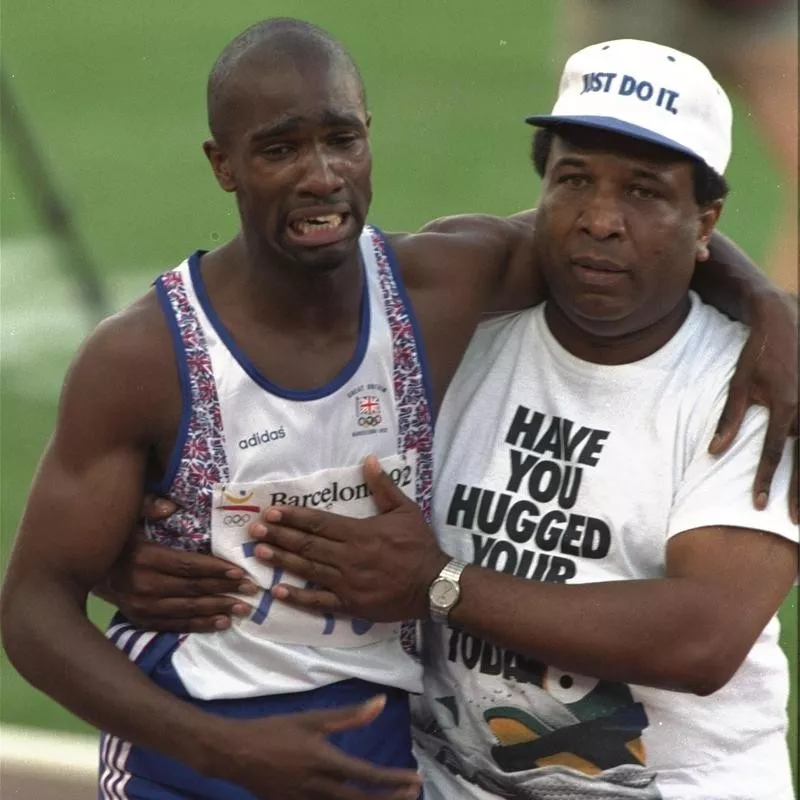 Derek Redmond is helped off track by father, Jim Redmond after injury