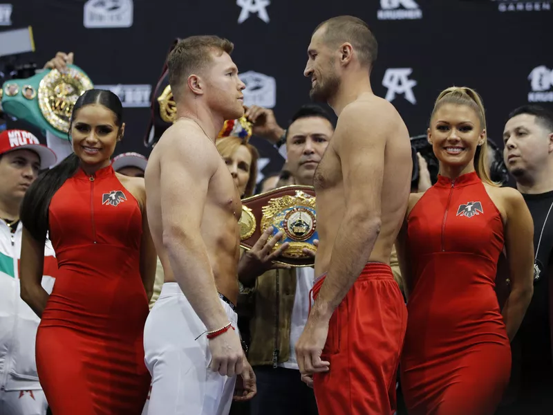 Canelo Alvarez and Sergey Kovalev pose for photographers