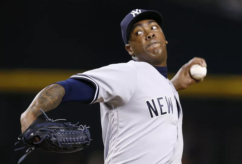 New York Yankees' Aroldis Chapman throws pitch