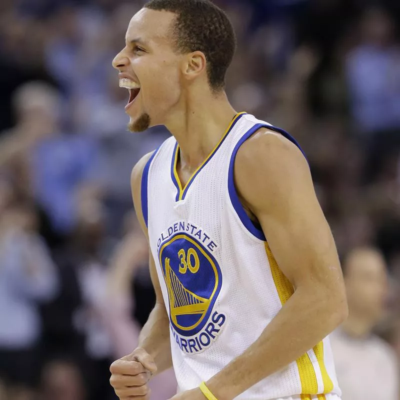 Steph Curry celebrates scoring against Houston Rockets