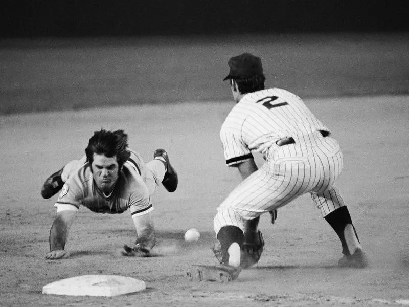 Pete Rose sliding into third