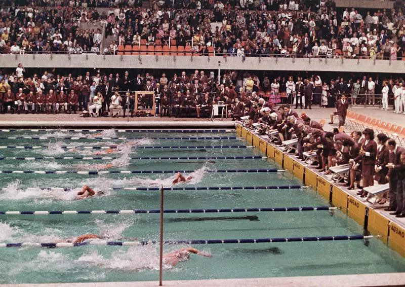 Michael Wenden swims to victory in 100-meter freestyle