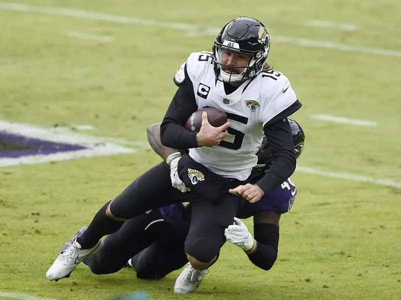 Jacksonville Jaguars quarterback Gardner Minshew II sacked by Baltimore Ravens linebacker Patrick Queen