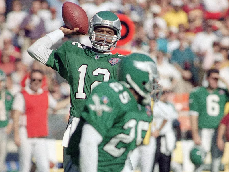 Randall Cunningham throwing to Charlie Garner