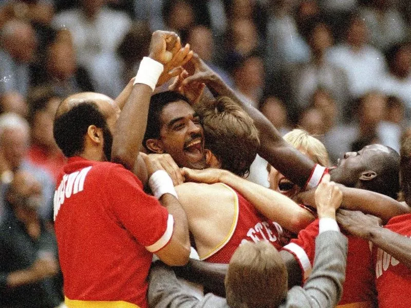 Ralph Sampson congratulated by team