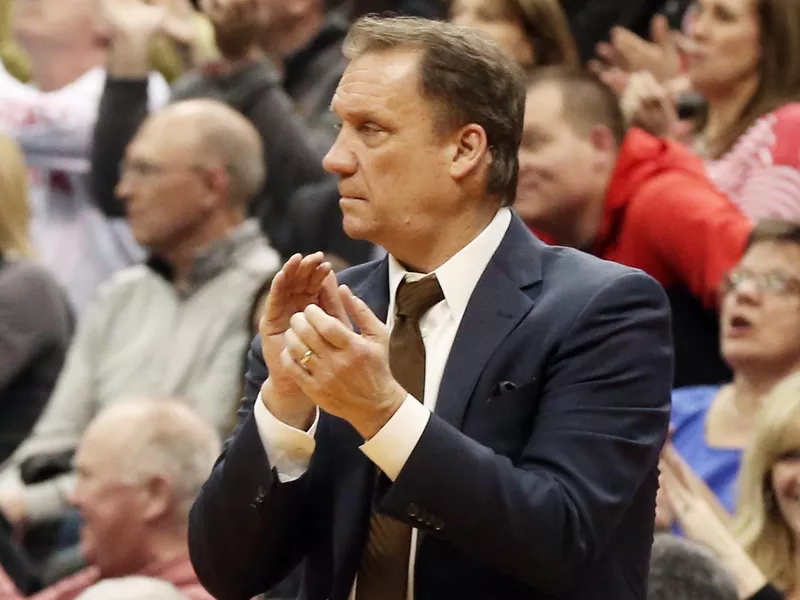 Minnesota Timberwolves head coach Flip Saunders applauds his team i