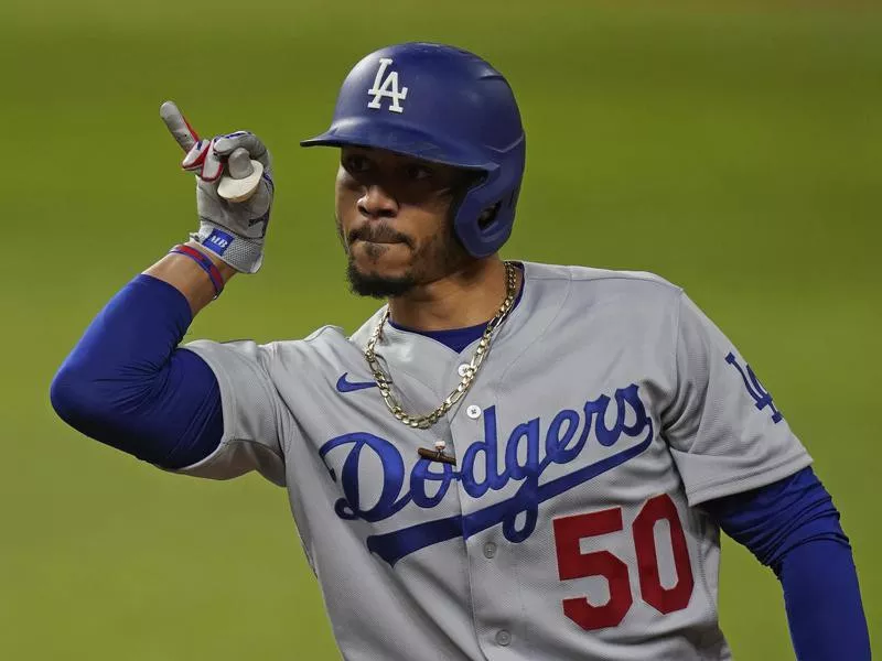 Los Angeles Dodgers' Mookie Betts celebrates his RBI single