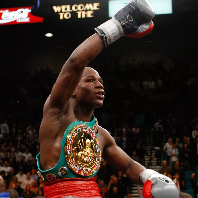 Floyd Mayweather Jr., celebrates after beating Ricky Hatton