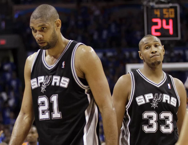 Tim Duncan and Boris Diaw head to bench