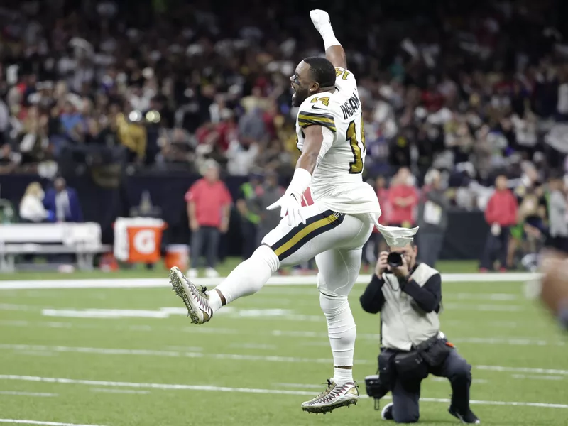 New Orleans Saints running back Mark Ingram leads stadium chant