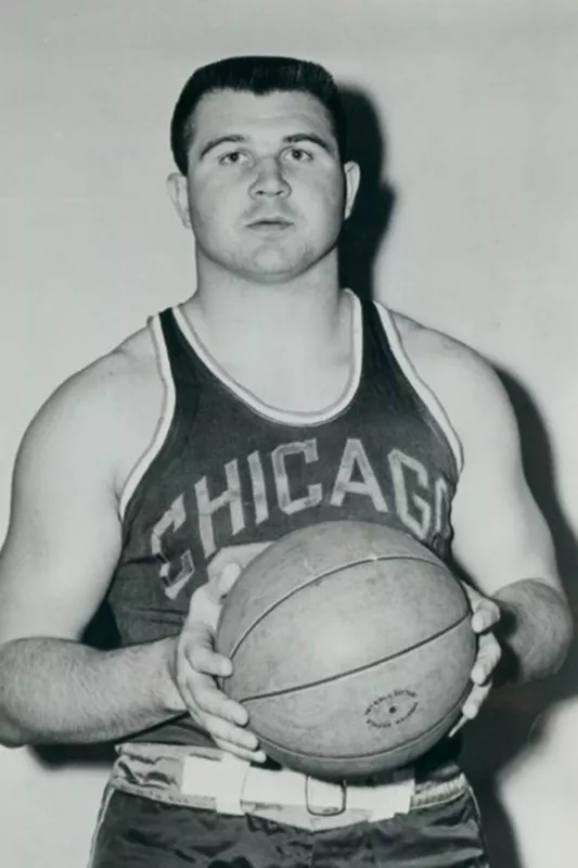 Mike Ditka holding a basketball