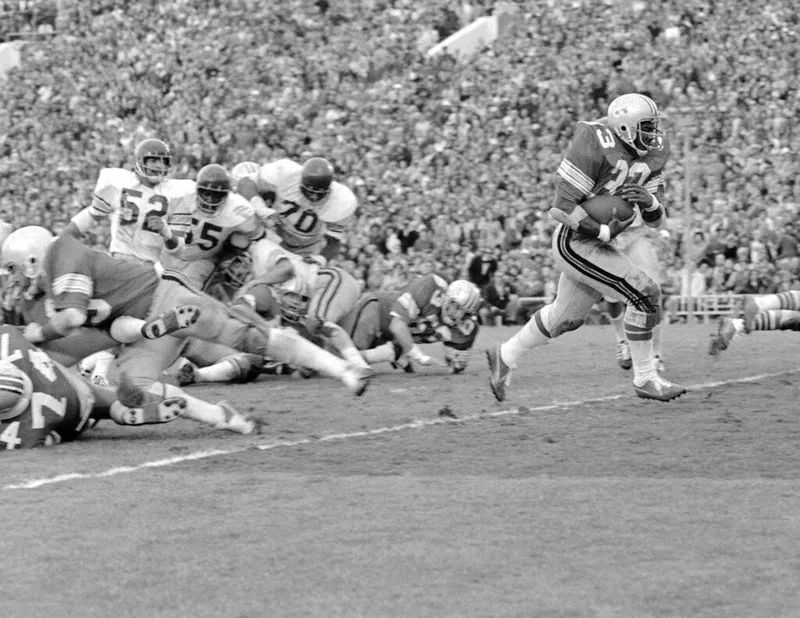 Fullback Pete Johnson charges across the goal line