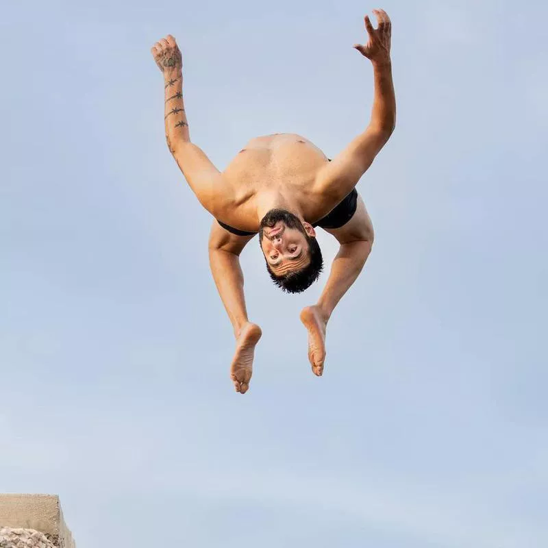 Man doing jump backwards