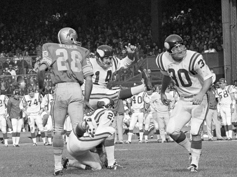 Fred Cox kicks a field goal