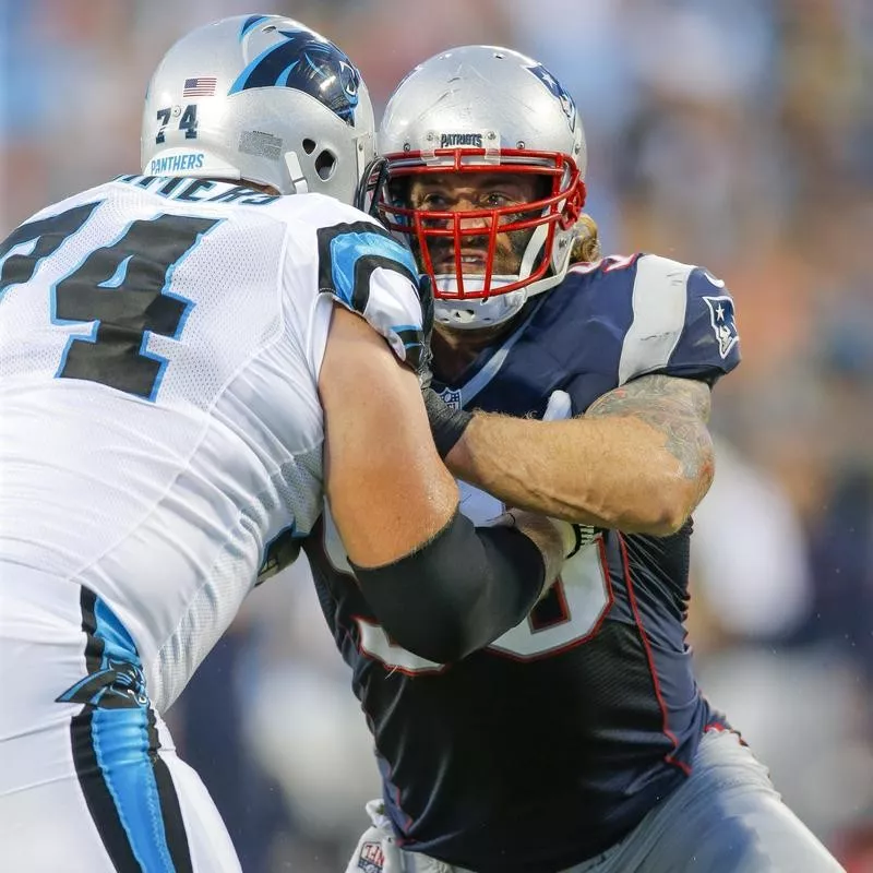 Chris Long battles against Carolina Panthers