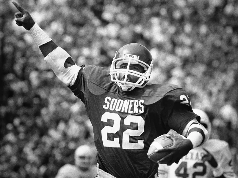Oklahoma halfback Marcus Dupree celebrates