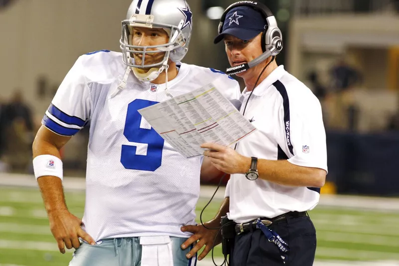 Tony Romo and Jason Garrett