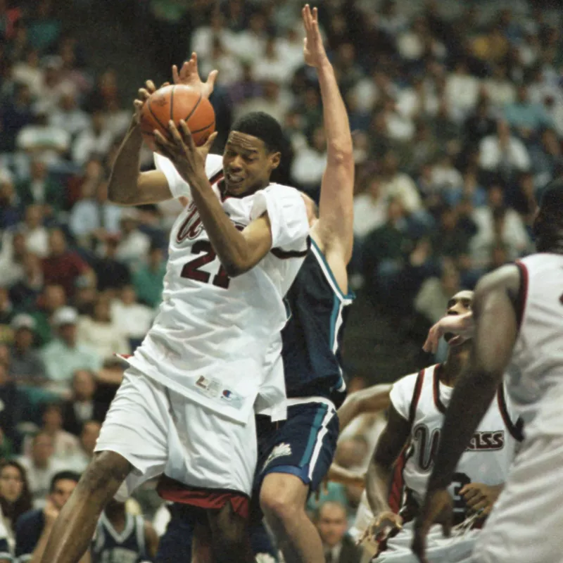 Massachusetts center Marcus Camby hauls in rebound