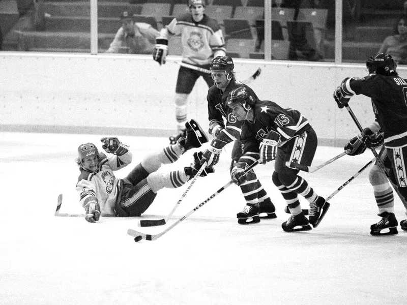 Mark Wells controls the puck