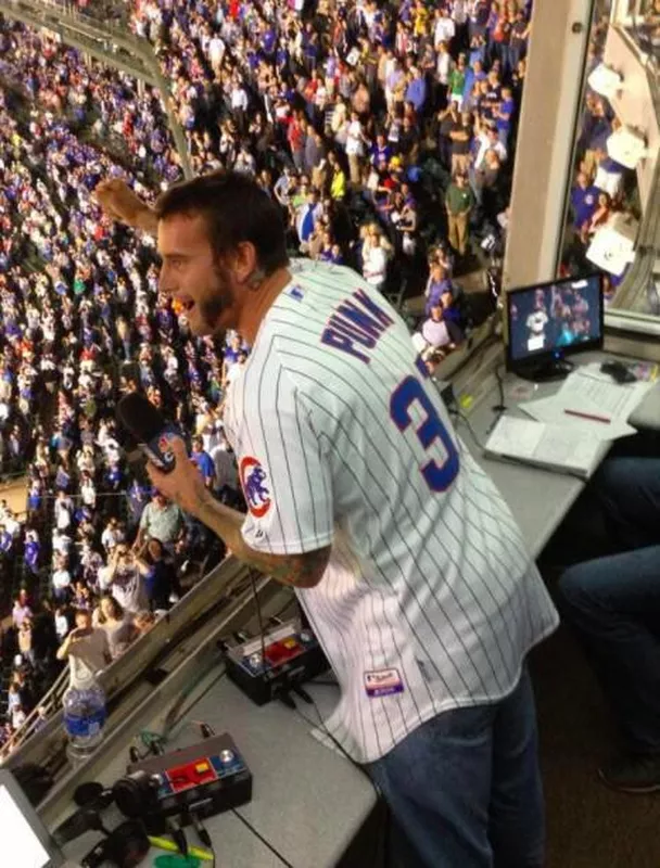 WWE superstar CMPunk sings seventh-inning stretch