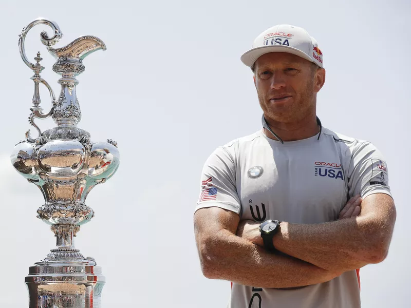 Jimmy Spithill stands alongside 