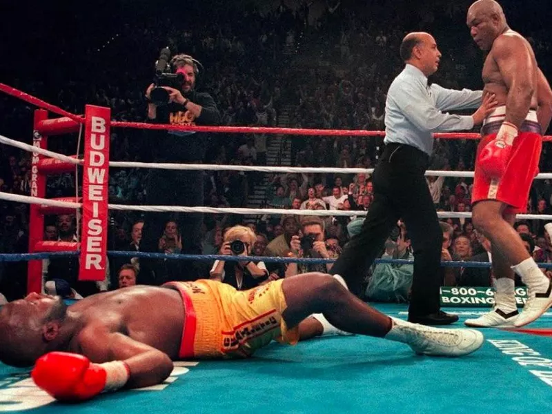 George Foreman knocks out Michael Moorer