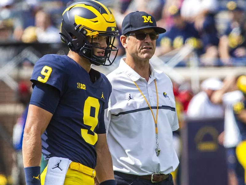 J.J. McCarthy and Jim Harbaugh