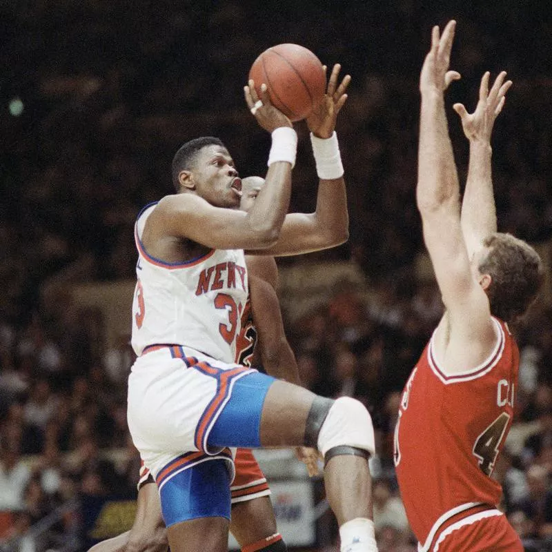 Patrick Ewing scores basket