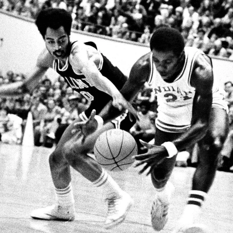 Quinn Buckner, right, of Indiana, steals the ball from Nate Williams of Illinois